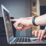Negotiation Handshake - person using laptop