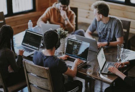 Business Expansion - group of people using laptop computer