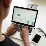 Financial Protection - person using MacBook Pro