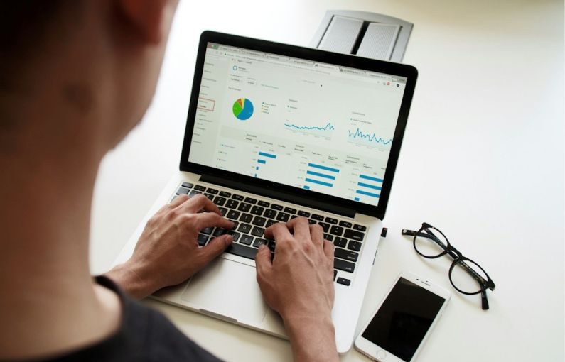 Financial Protection - person using MacBook Pro