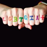 Portfolios Diversity - person with blue and red manicure