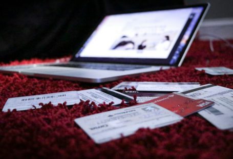 Credit Score - white printer paper on red textile