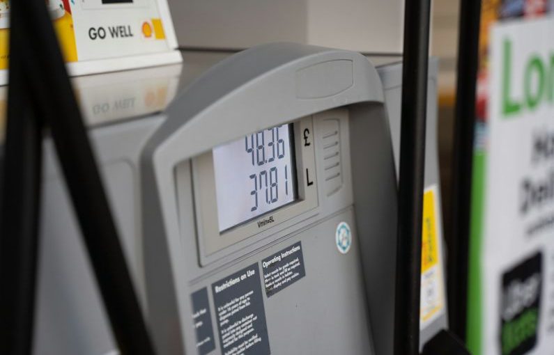 Inflation Shield - a close up of a gas pump at a gas station