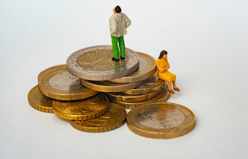 Divorce Finances - green and white ceramic figurine