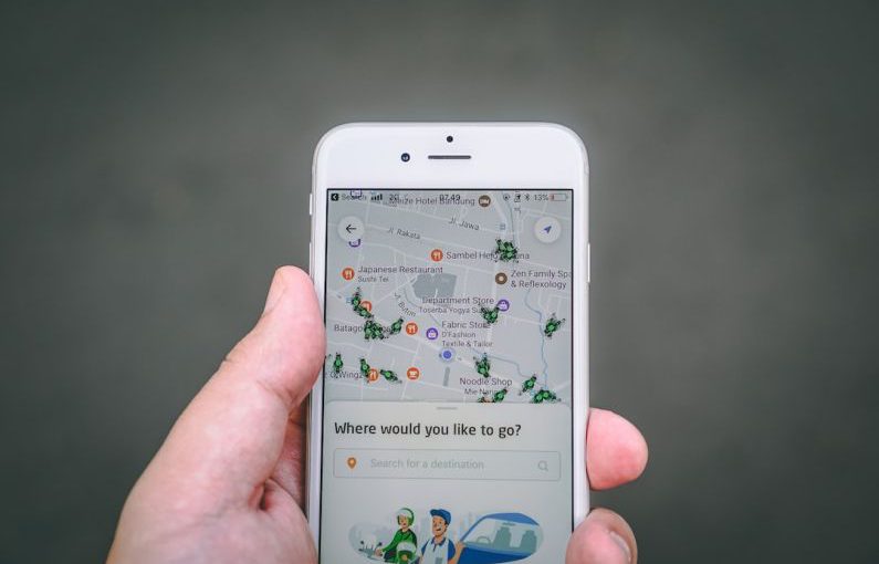 Gig Economy - person holding silver iPhone 6