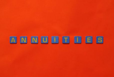 Annuities - Close-Up Shot of Text on a Red Surface