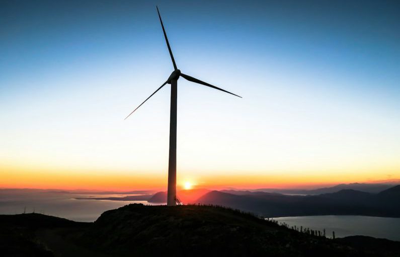Investor Silhouette - silhouette of wind mill during golden hour