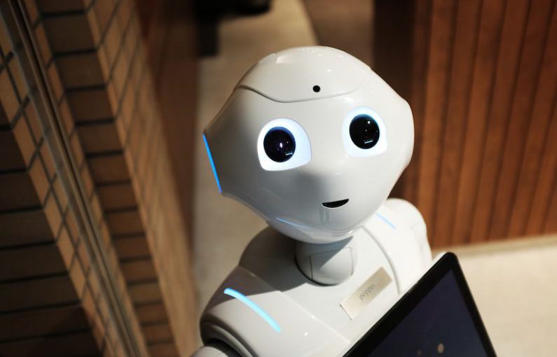 Blockchain Future - white robot near brown wall