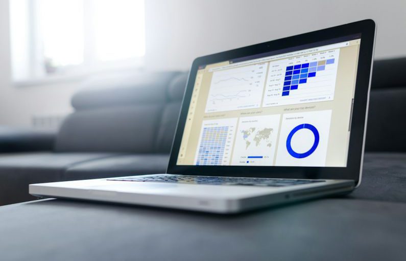 Mutual Funds Graph - turned on black and grey laptop computer