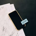 Tax Documents - black smartphone on white pad