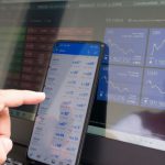 Forex Trading - black android smartphone turned on screen