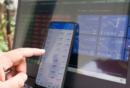 Forex Trading - black android smartphone turned on screen