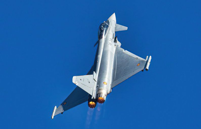 Peer-to-peer Lending - a silver fighter jet flying through a blue sky