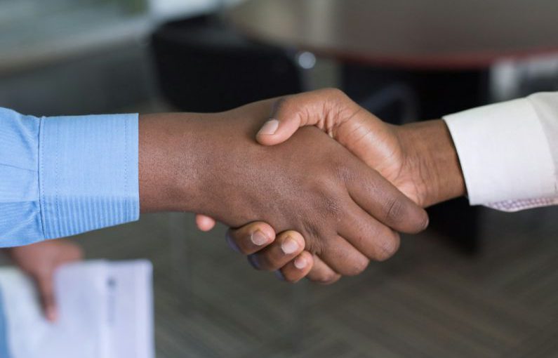 Handshake - two person handshaking