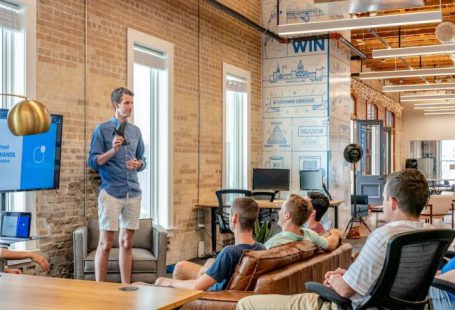 Business Models - man standing in front of group of men