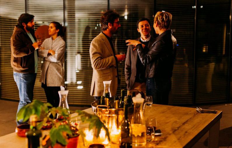 Networking Event - five person standing while talking each other