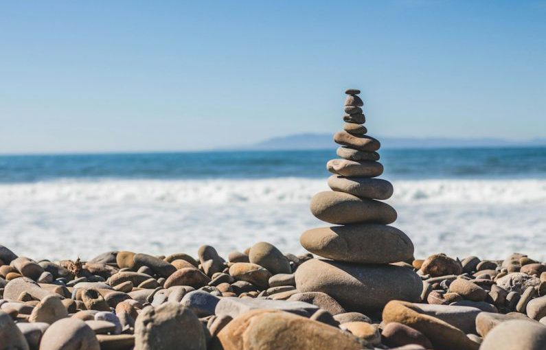 Work-life Balance - stack rock on seashore