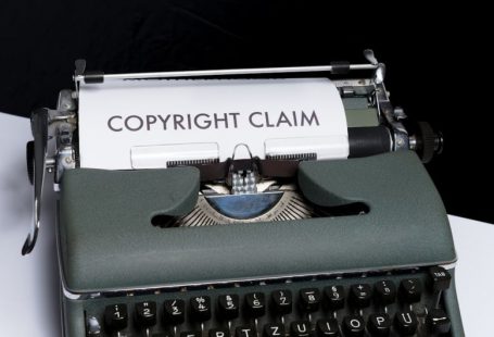 Intellectual Property - green and white braille typewriter