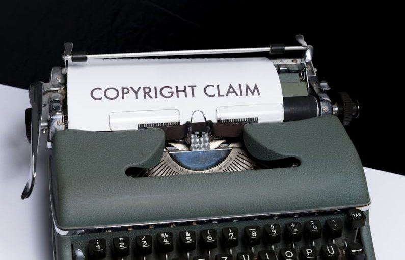 Intellectual Property - green and white braille typewriter